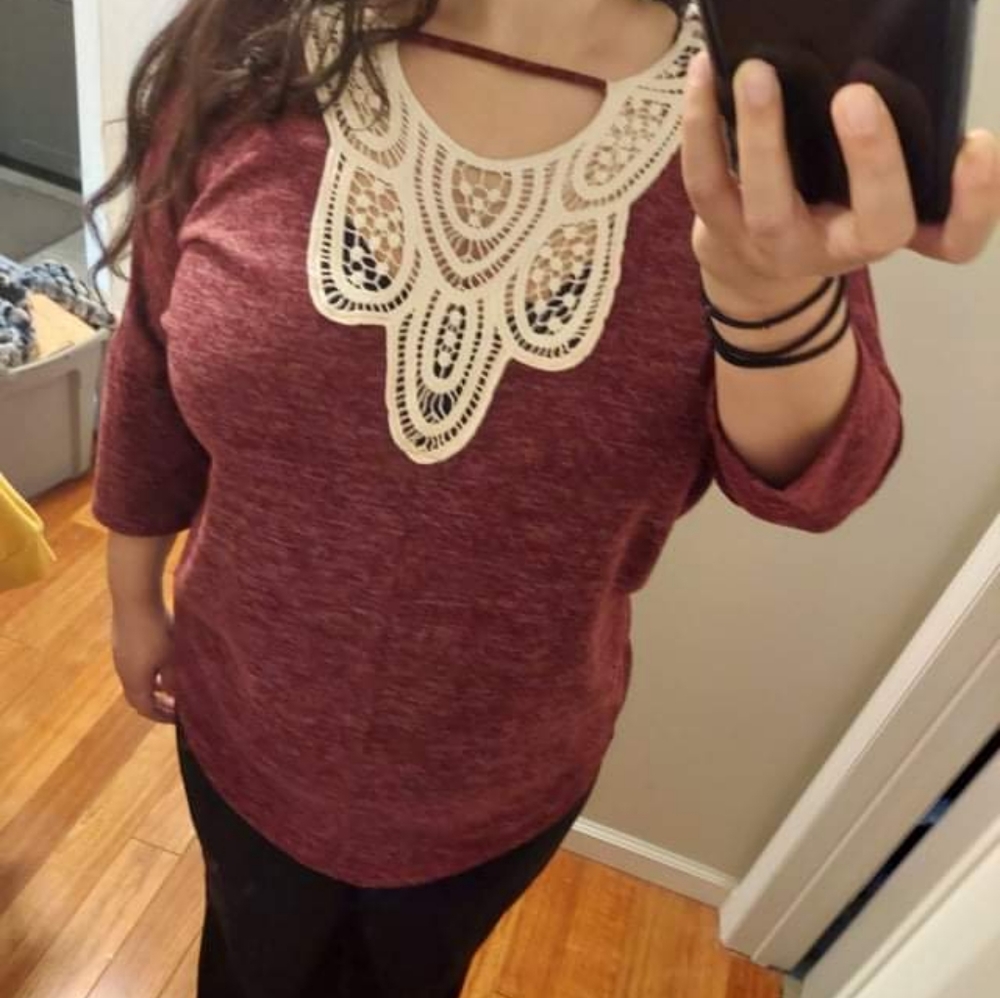 Red/maroon long sleeve shirt with cream lace neckline